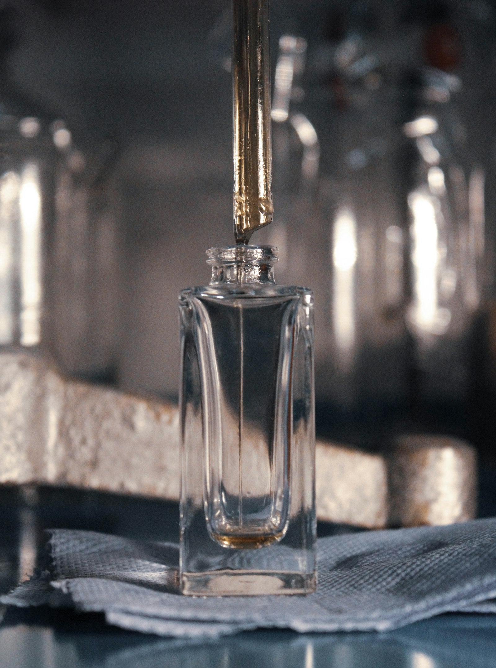 XI.11 formulation process — amber liquid pipette