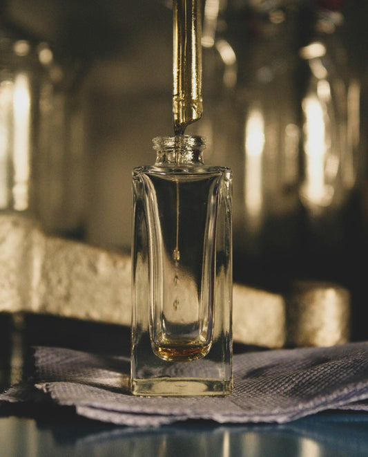 Alba — warm amber fragrance bottle